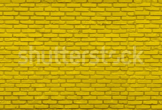 Rebel Walls R19634 Shutterstock Wall of Bricks Yellow- mural imitujący cegły