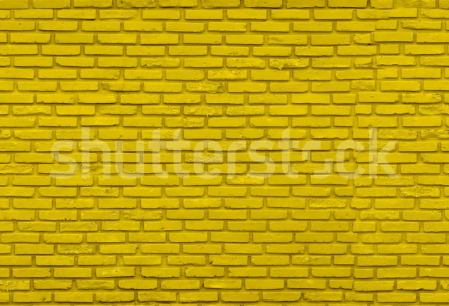 Rebel Walls R19634 Shutterstock Wall of Bricks Yellow- mural imitujący cegły
