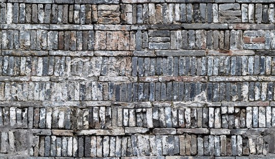 Fototapeta Rebel Walls Stacked Bricks R14811